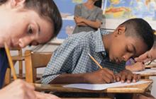 black and white students taking a test